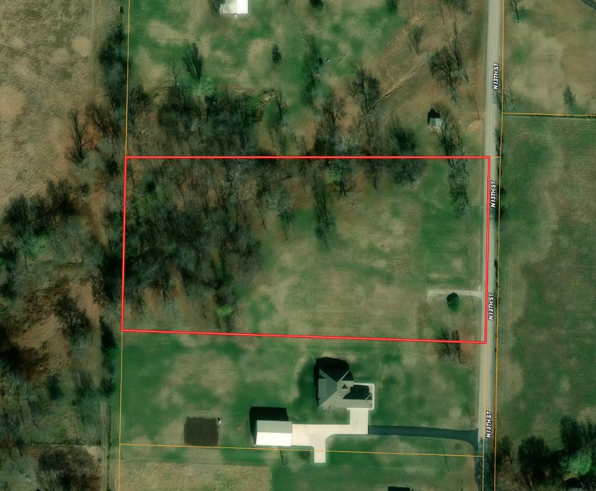 Prime opportunity awaits.  Location, Location, Location!  4.73 acres along paved road offering a chance to build in established area awaiting your dreams.  This hard to find opportunity and ready to develop site has water, natural gas, & electric at street. Only septic needed. Bring your vision and unlock the potential.   Survey already completed.  Thoughtfully designed protective covenants to help maintain the integrity, appearance, and long-term value of the subdivision. Standards include quality construction requirements, minimum home sizes, architectural review, underground utilities, and limitations on nuisance activities.