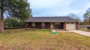 Charming 3 bedroom 1.5 home on a little under an acres with a huge privacy fenced yard and a garage. Newly updated in 2018 with NEW AC unit in 2024, New roof in 2018, new hot water heater in 2018, and new dishwasher in 2024!