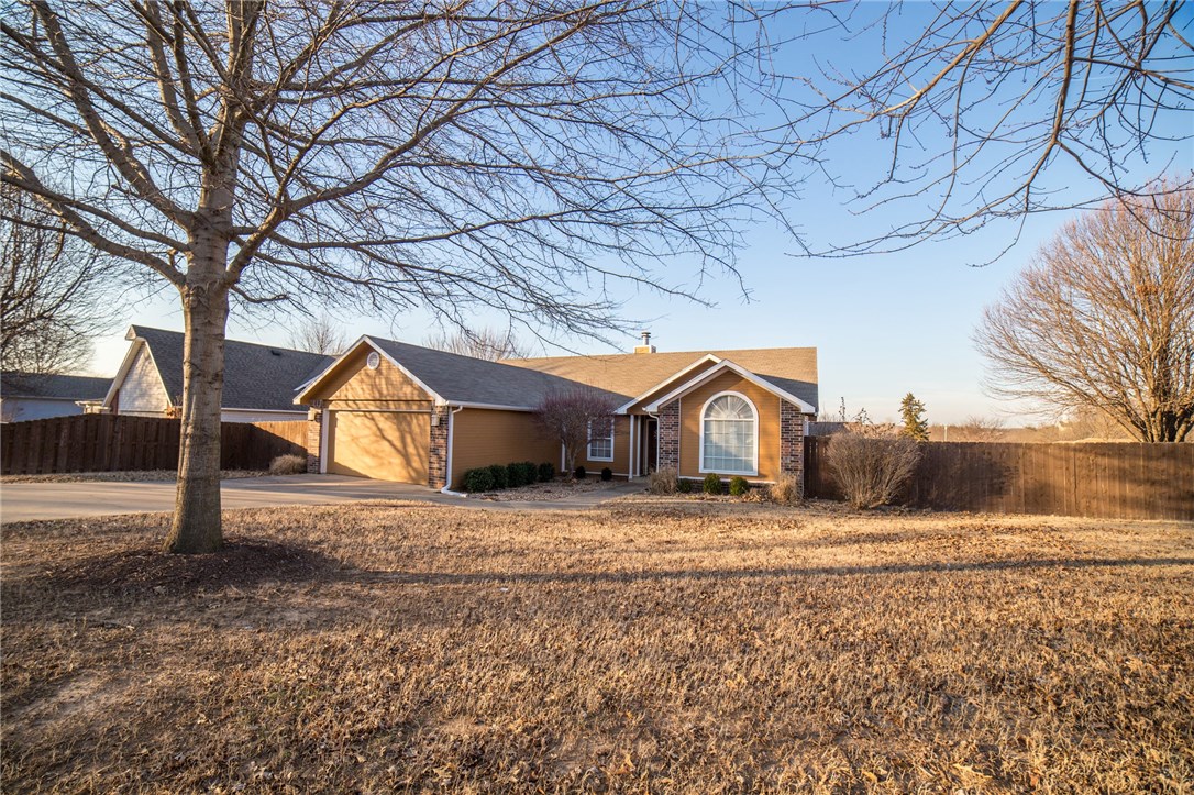 Stunning remodel with a remarkable floor plan! This home features Kraft made cabinets with soft-close technology, a stacked rock fireplace, granite counters, travertine tile, two living spaces, an eat-in kitchen, and a dining area. Great-sized backyard, deck, and landscaping make this home picture-perfect!