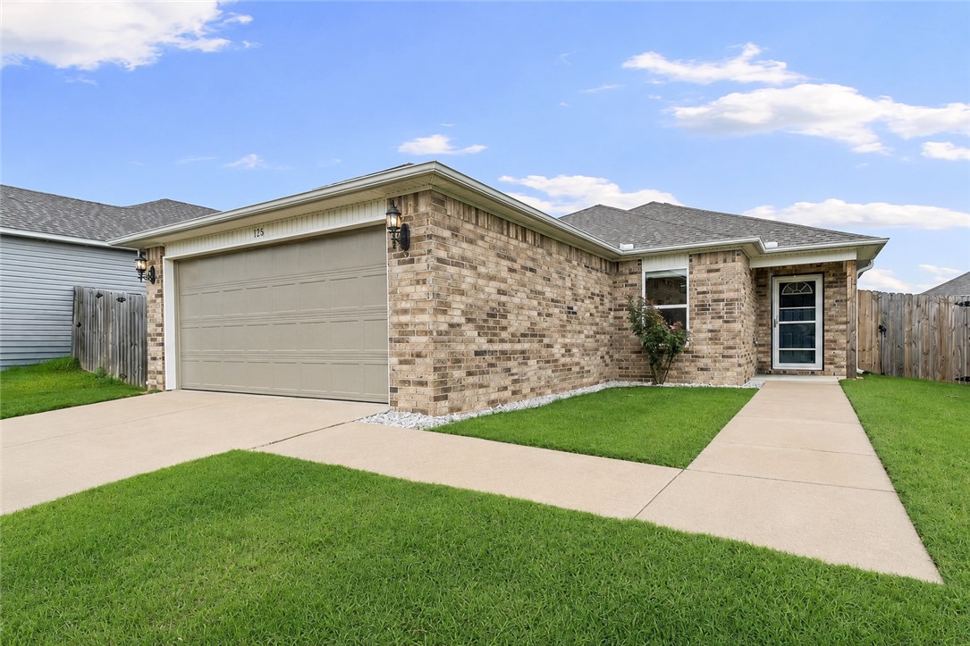 Imagine waking up to sunshine in the kitchen and coffee on the patio - that's daily life at 1156 S Ivory Bill Ln in Fayetteville's Park Meadows! This 3-bed, 2-bath home is only a few years old and it is SPOTLESS. Wood-look vinyl floors flow through the main living space, carpet keeps the bedrooms cozy, and the eat-in kitchen is made for slow mornings, complete with an ice maker connection and LED lighting throughout. Walk-in closets give you room to breathe, and ceiling fans keep things comfortable year-round. Bonus: they upgraded to a bigger HVAC unit than the house even needs, so comfort is never in question. Evenings are easy on the private patio, and the fully fenced backyard is ready for pets or play. And yes, the fridge, washer, and dryer all stay! Super close to Fayetteville's shopping, dining, parks, Razorback Greenway and the U of A. This lifestyle won't be on the market long!