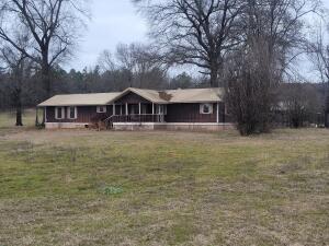 7 Beautiful Rural Acres- Ready for Your vision! **ADDITIONAL ACREAGE AVAILABLE**Nestled in the countryside, this 7-acre property offers peace, privacy, and endless possibilities.  Equipped with water, electric and septic, its ready for your next home or getaway. 30'x44' shed includes a 24'x10' fully enclosed space, perfect for storage or a workshop.An older 3-bedroom, 2-bath mobile home is included AS-IS and could be repaired or replaced to suit your needs.  Located close to the National Forest, this property is ideal for hunters, outdoor enthusiasts, or anyone looking to enjoy nature.Don't miss this opportunity-contact me today for more details!