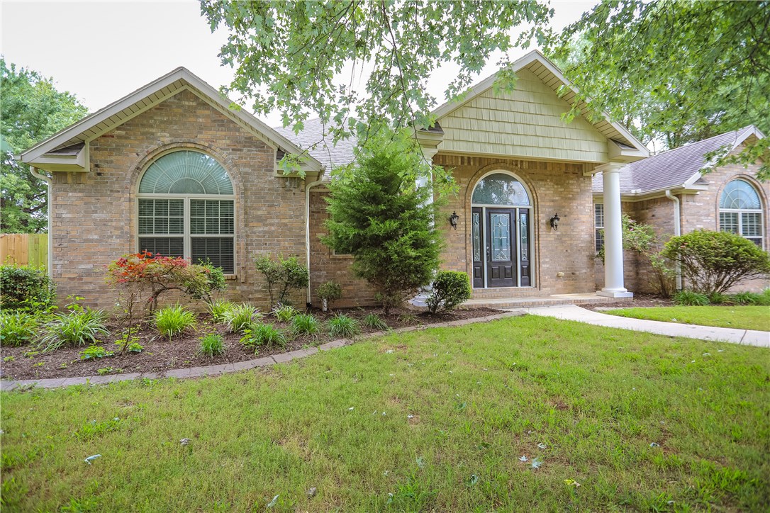 It feels like you are in the country, but you are just a few minutes from all the action in Bentonville!  The square footage includes the heated and cooled shop or office space off of the garage.  Huge, flat lot making it easy to add a pool or extra shop building.