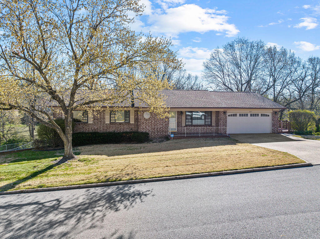 This is a large five bedroom home that could easily be made into a hard to find 6 bedroom home. Located just blocks from Skyline Elementary. Centrally located in town to easily access shopping and work. It's all brick exterior means that it has great curb appeal and is easier to maintain than many other materials. It has a fenced in back yard to keep your four-legged friends safe. The downstairs could easily be used for multi-generational living with its complete kitchen make it a 3-bedroom apartment. Also, is mobility a problem? There is already a chair lift to help you up and down the stairs. Call your favorite Realtor today to schedule a look.