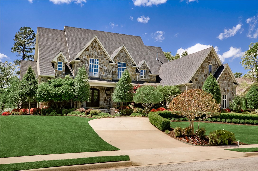 REDUCED!!! EXQUISITE ONE-OF-A KIND QUALITY CUSTOM-BUILT HOME, LOCATED ON THE 14th GREEN w/ENGLISH TUDOR STONE ARCHITECTURE DESIGN OFFERS 5 BDRMS, 4 FULL & 3 HALF BATHS, FORMAL Living, FORMAL Dining, GOURMET KITCHEN w/OVERSIZED CUSTOM ISLAND, HEARTH RM, SCREENED SUN PORCH COVERED STONE DECK, LIBRARY w/BUILT-IN, OFFICE, BONUS ROOM. OVERSIZED SECONDARY BDRMS, RICH TRIM THROUGHOUT, JULIAN BALCONY, WATERFALL IN BACYARD, and MUCH MORE.  PLEASE CALL AGENT FOR A LIST OF ALL UPGRADED FEATURES!!