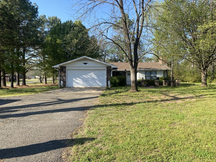 Spacious 3-bedroom, 2-bath home on 1.8 acres with easy highway access. This property offers a blend of country living and accessibility, making it ideal for those that do not want to be right in town. 
The home features a spacious living area with a functional layout for the kitchen and a bonus room with ample space. With the primary suite having its own bathroom and walk in closet.
Outside there is plenty of room for gardening, outdoor activities, or even future improvements.