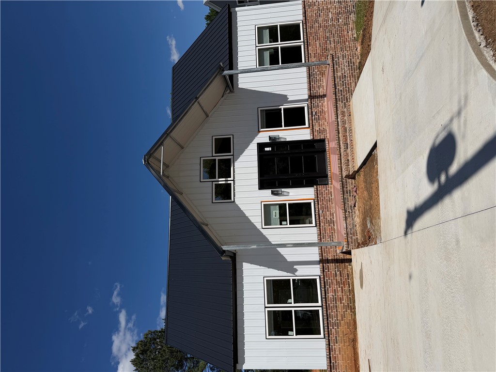 NEW CONSTRUCTION  Never been lived in and you will not find a new construction on the market for under $150 per square foot.  Come check out the cute, energy efficient, 2 story home located in the heart of Atkins.  Walking through the huge front door step right into a cozy living room looking back into the Granite top kitchen with all new appliances.  The 3 Bedrooms and 2 bath with walk in closets, stained concrete floor, nice back deck on the rear of the home and an awesome  circle drive all make this the perfect buy for 2026.  You can have instant equity on comparable sales the day you get the keys.