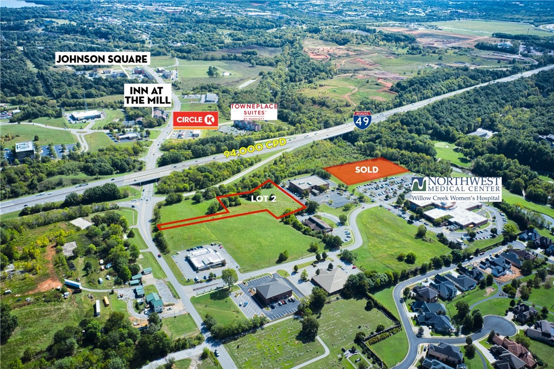 Prime acreage for sale within minutes of Fayetteville & Springdale with I-49 visibility. Nearby businesses include Willow Creek Women's Hospital & NW Medical Center ER, Collier Drug Stores, Towneplace Suites, Arvest Ballpark, & many more. Johnson is an up-and-coming area for NWA with steady commercial development & residential growth. Prominent medical office park within the Springdale Care Corridor. Near Johnson Mill Square development. Lot accessible to all utilities. 4 miles from Washington Regional Medical Center.
