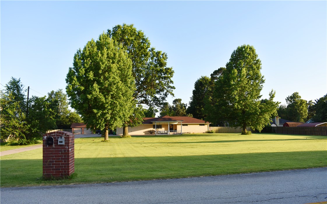 You won't find anything else like it in this area, with these Acres for this Price!! Beautiful Home on 1.72 Acres!! New Roof in 2016. Centrally located to Everything! Short distance to shopping, restaurants, schools, main roads/highways and more! Be within city limits but enjoy the tranquil feeling of a rural property! 4 bedrooms, 2 full beautiful baths and a lot of room for the family to run, play, barbecue, garden, or just enjoy the fresh air.