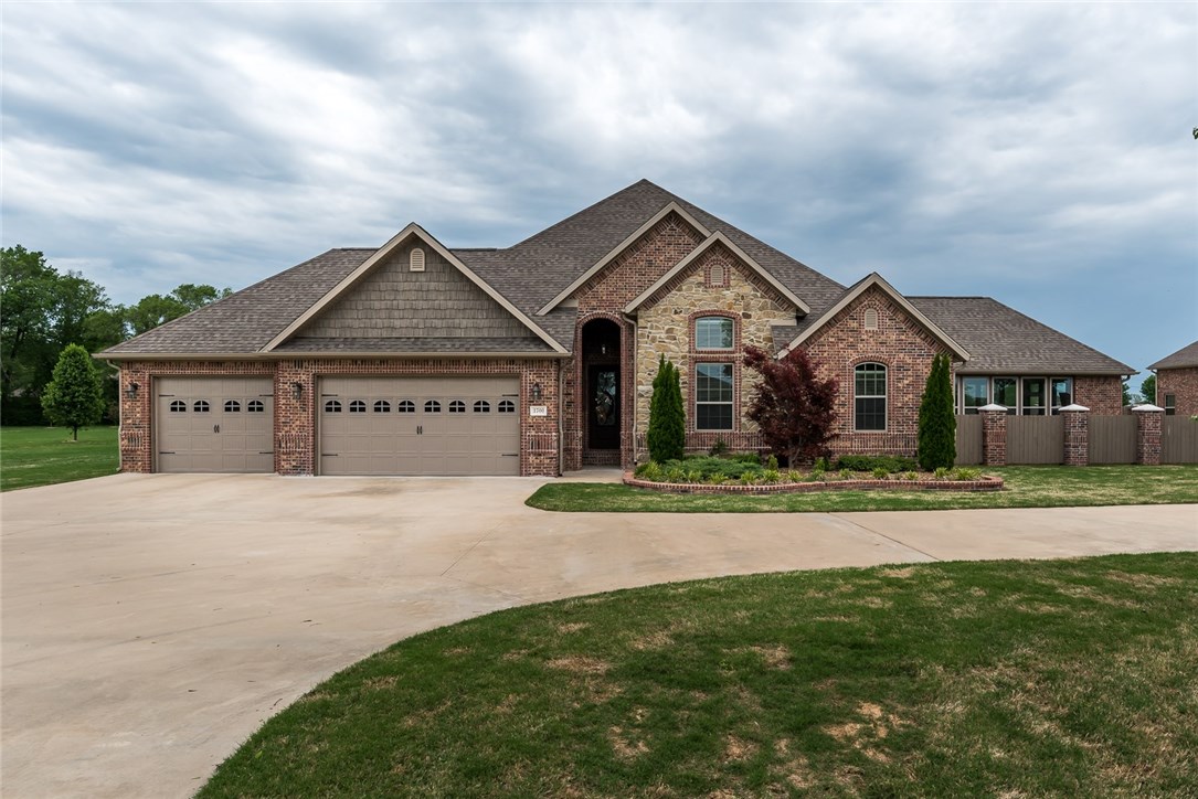 Impeccable Custom home on 2 acres. Inviting Entrance leads to a Spectacular Living Area w/Gorgeous Hardwood Flooring, Impressive Wood Beams & Elegant Woodwork. Beauty Continues into Kitchen Loaded w/Custom Cabinets, Copper Farm Sink & a Large Island. Wet Bar & Built-in Office area that Unfolds into a Stunning Sunroom! Retreat outback to a Lovely Courtyard & Pool, fit to Entertain or just Relax. Mammoth Garage/Workshop lacks for nothing. 3 Garage Doors, Climate Controlled, Full Bath & Bonus Room.