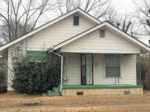 After some TLC, this old town charmer could have tremendous investment potential. Larger back yard completely fenced with covered back patio and detached 2 car carport.