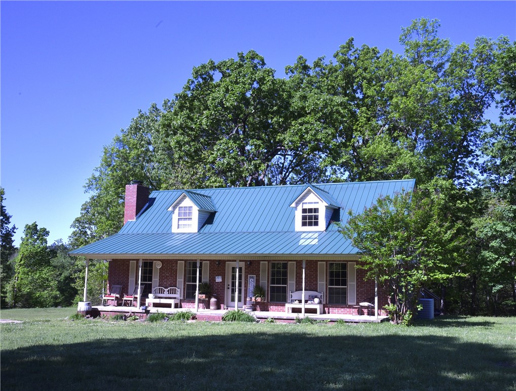 Check out this beautiful turn-key brick home in the Arkansas Ozarks on 5.5 secluded acres. Acreage is mostly level with open and wooded ground. Home's main level features a large living room with gas fireplace, kitchen/dining combo, primary bedroom and bath, guest bath and laundry. Upstairs are two large bedrooms with dormer windows. The covered front porch and the covered deck  let you soak in the tranquility of a beautiful secluded setting. Property is located near the Buffalo National River, between Silver Hill and Marshall. 15 minutes to Tyler Bend and less to Bear Creek, Grinders Ferry and Marshall. Less than 90 minutes to Branson, MO, and world class fishing in Bull Shoals, Table Rock, Greers Ferry and Norfork Lakes, the White, Kings, and  Little Red Rivers, Crooked and Clear Creeks, along with many swimming, floating, hiking, camping, fishing, hunting and sightseeing venues! A great spot for an Air BnB or permanent residence. This property really deserves your attention! Come and enjoy the Ozarks from here!