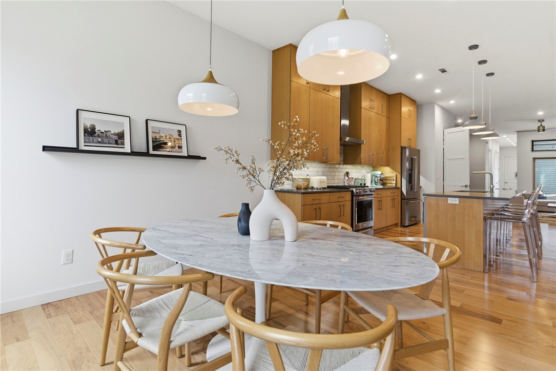 If you’ve been chasing the Bentonville lifestyle… this is it.
Located in the heart of downtown, just moments from the Square, 8th Street Market, and the new Walmart Home Office, this home puts you exactly where everything is happening—without sacrificing privacy or design.
This isn’t about square footage. It’s about how you live.
Morning coffee turns into a walk to your favorite spot. Evenings mean dinner downtown, drinks with friends, or biking the trails just minutes away. It’s a lock-and-leave lifestyle with everything at your fingertips.
Inside, the home is intentionally designed—soaring ceilings, expansive windows, and a clean, modern aesthetic that feels both elevated and effortless. The kitchen blends function with style, while every space is built to feel open, light, and connected.
Upstairs, the primary suite becomes your personal retreat, with a spa-like feel that makes it hard to leave in the morning.
With features like solar panels and smart home technology, it’s as efficient as it is beautiful.