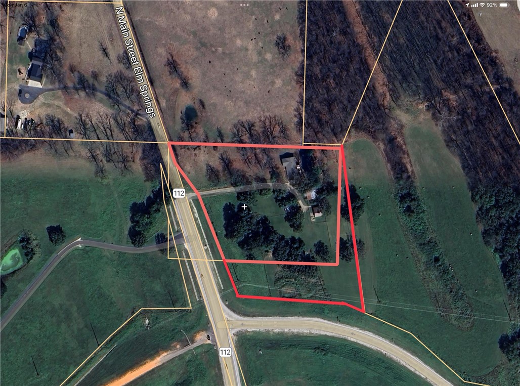 The value is in the land.  This great location is on the NE corner of 612 by-pass and Hwy. 412 and is primed for development.  Hwy. 112 is going to be expanded to a divided 4 lane hwy from Springdale to Bentonville and the 612 by-pass is currently being expanded from Hwy. 112 to Hwy. 412 in Tontitown.  There are future plans for the 612 by-pass to expand east from to 265 and later to the Sonora area.  There will also be a new road leading to the airport from 612 just 1 mile west from this property.  All of this makes this a great opportunity for development. Do not knock on door.   Structures will not be shown.  All offers must be accompanied with proof of funds.  Propane tank and gazebos do not convey.  Property includes home, separate living structure, pole barn, seperate garge, storm cellar and outdoor arena. Please reference MLS 1295123.