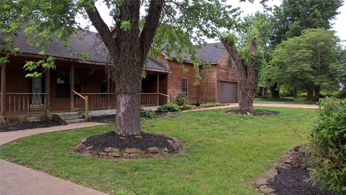 Plenty of space inside and out in this home. that features dining area with rock wall and master bedroom with wood ceiling and cedar line closet in the master closet. 3 other bedrooms as well as bonus area. Enjoy large deck with built in seating as well as a covered area to stay in the shade. Large lot. Extra garage with 2 door space as well as attic storage. This is a Fannie Mae Homepath Property, submit all offers at www.homepath.com.