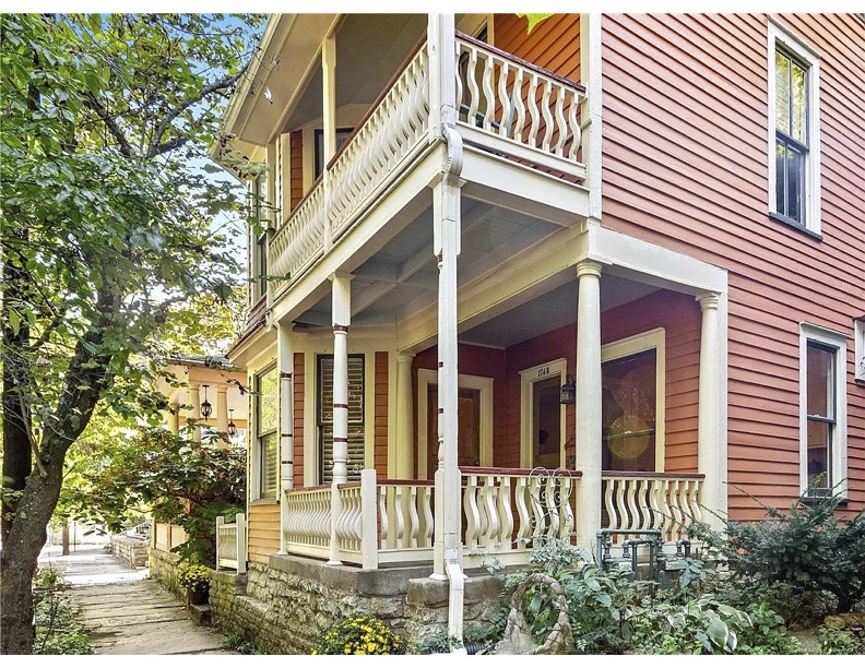 You can't beat the premium downtown Eureka Springs location of this historic Victorian, two-story tourist lodging cottage with all the charm and character imaginable. A desirable Eureka getaway currently operating as two nightly lodging units. Zoned C-3 commercial which allows numerous other uses. Keep one unit for yourself or draw income from both and block off time when you want to visit. Each unit is a 1BR/1BA with a kitchen and living area. The house has all the character that makes a great cottage: beautiful vintage pine floors, bay windows with bench seating, fish scale accent shingles, corbels, and stained glass. Each remodeled bathroom has an oversized shower with white subway tile walls and black hex tile floors. The main level has a front porch and French doors out to a secluded back patio with limestone bluffs. The second floor has a covered porch off the bedroom and a balcony in the back. A great location for a VRBO, ALL furnishings convey. Short jaunt to your favorite downtown shops and restaurants.