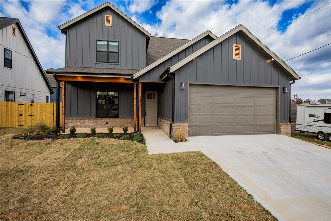 $3500 preferred lender credits!  NEW construction near the Promenade and Rogers Aquatic Center! These elevated homes showcase stunning design with white oak flooring, high-end countertops, and designer tile selections throughout. Vaulted ceilings and floor-to-ceiling cabinetry create a grand, open feel, while the butler’s pantry, with counters and outlets, keeps your gorgeous kitchen clutter-free.
The primary suite is a true retreat, featuring a spa-like bath with a frameless glass shower wrapped in floor-to-ceiling tile, and dual vanities. The spacious walk-in closet offers custom shelving, drawers, and hanging space for ultimate organization. Upstairs, you’ll find three additional bedrooms and a full bath with the same elevated finishes, plus one room easily doubles as a bonus living area.
Outside, enjoy full sod, front landscaping, and a private backyard with a gate and wood privacy fence!