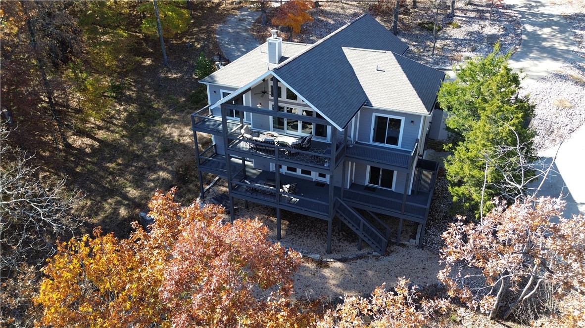 Discover the perfect blend of craftsmanship, comfort, and lakeside living in this custom-built 4 bd, 4 ba Beaver Lake home, completed in 2017. Thoughtfully designed with quality finishes throughout, this 2,695 sq ft retreat sits on just over an acre of gently sloping land with a short, easy walk to your dock access.
Located on the highly desirable end of Beaver Lake, this property offers beautiful lake views, peaceful surroundings, & close to Starkey Marina and Beaver Dam—all on a paved, dead-end road with welcoming full-time neighbors.
A rare find—this home includes a 30x11 slip in a co-owned dock equipped with a boat lift, and resurfaced composite materials.  It’s just a quick, gentle stroll to the water’s edge, making lake days effortless.
Designed for both full-time living or weekend retreats, the home features open living, modern finishes, & expected amenities.
A move-in ready lakefront home with rare dock access on Beaver Lake, 6 mi to Eureka, 4 mi to Beaver Dam & 28 mi to downtown Rogers.
