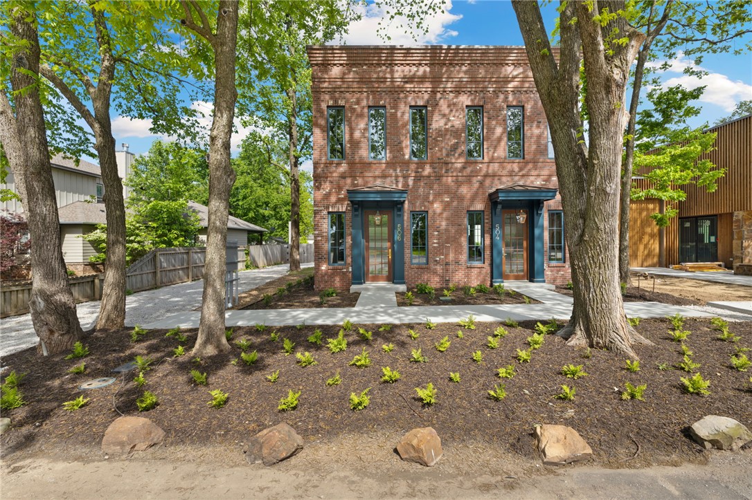 The most elegant 1 bed 1.5 bath home in Bentonville!  Petite luxury featuring double 2x6 walls with deep white oak jambs and windows, mahogany doors, Subzero Fridge and Wolf Range. Designer lighting and plumbing fixtures. Private courtyard patio and lawn at the rear, along with paved parking area. Fully irrigated and professionally maintained native landscaping. Steps from the Bentonville square, Park Springs Park, Compton Gardens, and Crystal Bridges!