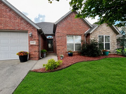 Beautifully maintained 3BR/2BA all-brick home in a quiet neighborhood just 10 minutes from the Bentonville Square and 5 minutes from Coler Creek trails. Offering just over 2,200 SF with 9-foot ceilings throughout, this home feels spacious, bright, and inviting. Enjoy all hard-surface flooring and a well-appointed kitchen featuring KitchenAid appliances, including a gas range. Large windows fill the home with natural light, while the sunlit dining area opens to a patio and fully fenced backyard. The oversized primary suite offers space for a sitting area or home office and includes private patio access. Generously sized bedrooms, functional living spaces, and a prime location near trails, dining, shopping, and entertainment make this move-in-ready home an exceptional opportunity.