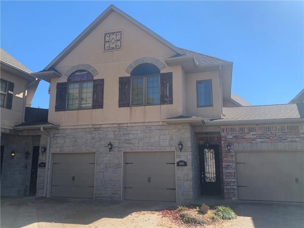 Enjoy the convenience of Condo living! Great location near trails, Pinnacle shopping & entertainment, Mercy and I-49. The main level is open plan living, dining, kitchen with all appliances, half bath, outdoor patio and one car garage. Both upstairs bedrooms feature full ensuite baths and a landing laundry area with washer/dryer. Move-in ready so call for your tour today!