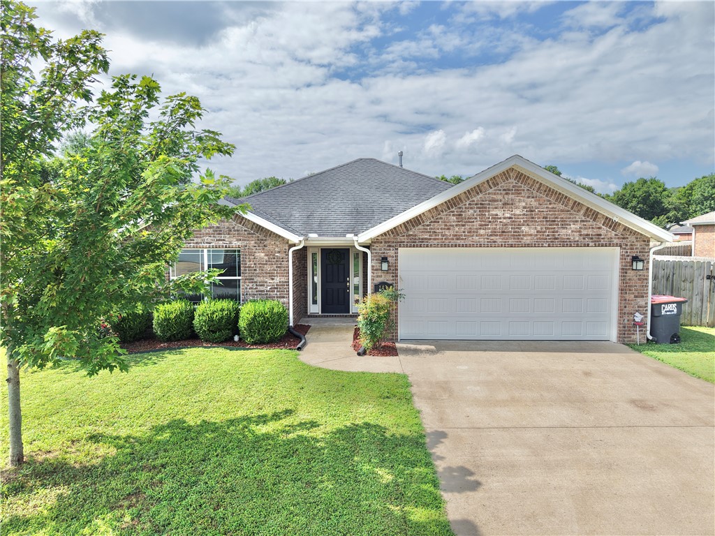 Enjoy the quiet Elkins community in a well equipped brick home only 12 miles from U of A campus.   This 3 bedroom, 2 bath home has an impressive kitchen with lots of cabinet and drawer space, stainless steel appliances, granite counter tops, and open view of dining area, living room, and back yard.  The living room has a gas fireplace and high ceiling.  Large primary suite has tray ceiling, walk in closet, and spa like bath with walk in shower and jetted tub.  Ceiling fans in all bedrooms and laminate wood flooring in main living area.  Washer, dryer, refrigerator stay as well as raised beds in back yard.  Cameras & Security system stay.  Managed by Alert Alarms for a monthly subscription.  Fenced back yard with a patio to relax on.  It's a quick drive to Bunch park, public library, white river, and local dining and shopping.  Enjoy this well maintained, functional floor plan in a great location to stay local for everything or be in Fayetteville daily if wanted.
