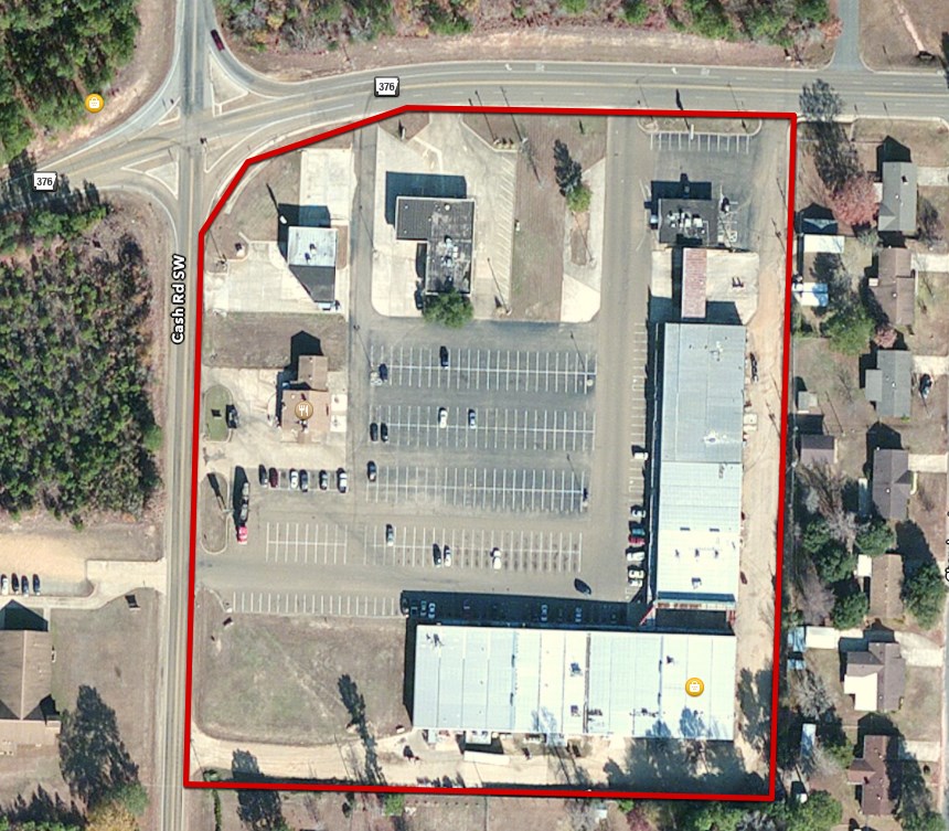 Great Cap Rate! Large retail strip center anchored by regional grocery chain and national tenant with sales percentage bonuses. 59,044 sq ft retail with Laundrymat, car wash, tobacco store,  with long term leases. Additional acreage included for room for expansion with additional stand alone building. New roof in 2012 lots of improvement and plenty of parking.
