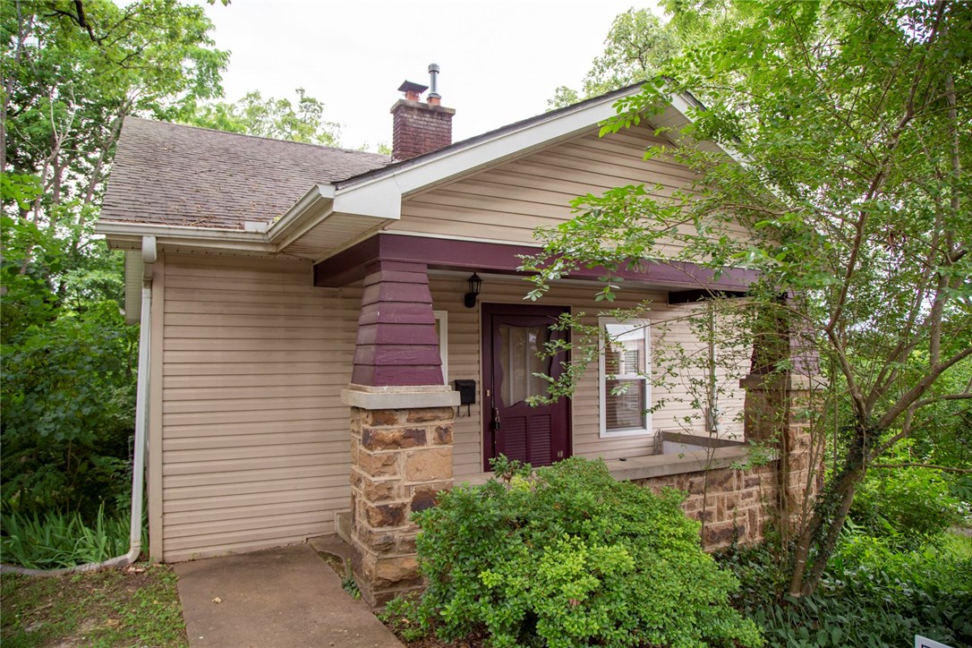 Lovely bungalow home in Wilson park area and less than a mile to U of A campus. Close to NWA Greenway Trail system and the Fayetteville square. Close to everything but quiet and surrounded by many mature trees. Hardwood floors through most of house. Gas cook stove, full-size fridge and dishwasher. Full size washer/dryer. Has a basement that could be used for extra storage. 1-car garage with automatic garage door. Corner lot. Tenant occupied until 7/31/26. Application fee $25 per adult. Security Deposit $1,795. Cleaning Fee $250.