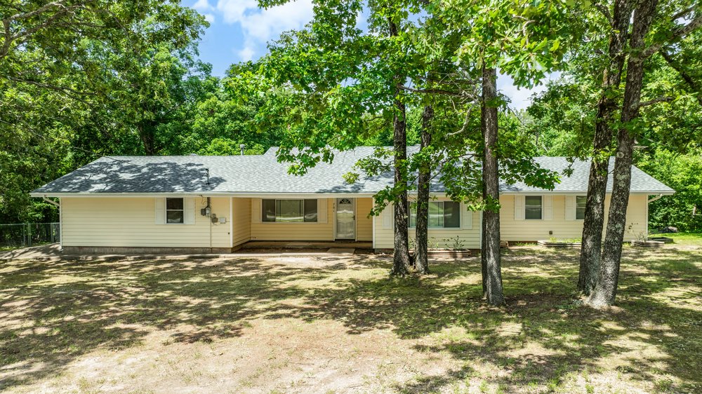 Welcome home to this well-maintained 3-bedroom, 2-bath home nestled in an established, private country subdivision.  Inside, you'll find spacious rooms designed for comfortable living, including a cozy family room featuring a wood-burning fireplace insert-perfect for relaxing on cool evenings.  Step outside to enjoy the fenced backyard, ideal for pets, play, or entertaining.  Need extra space? The impressive 720 square-foot shop offers concrete floors and electricity, making it perfect for hobbies, storage or a workshop. If you're looking for peaceful country living with room to spread out while still enjoying the convenience of a welcoming neighborhood, this property is one you won't want to miss! New roof