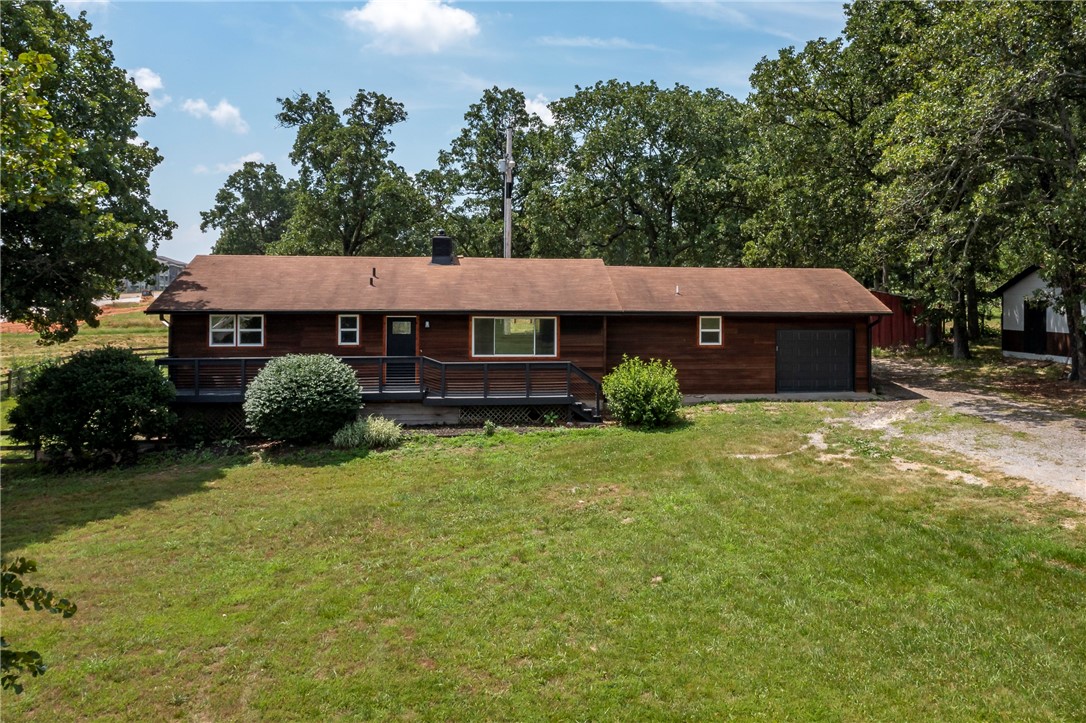 Beautiful 4.4 acres more or less property located in the Ballpark/Southwest Overlay District featuring an updated home, barn, shop, and an outbuilding. Home updates include new flooring, appliances, windows, paint, fixtures, and doors. Also features an 888 sqft basement with a full bathroom and can be used for extra storage, etc. Reside in the home or use it as an office. Lots of different possibilities with this property. Schedule your showing today!