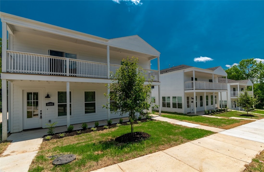 Incredible investment opportunity in amazing location! Walking distance to Baum-Walker Stadium (Razorback Baseball), trails, and more!  Only minutes to University of Arkansas, shopping, dining, mountain biking, parks, I-49, Fayetteville Square, Farmers Market, and so much more! Property includes 3 brand new luxury duplexes for a total of 6 units! Each unit is 3 bedroom, 3 full bath, 1 half bath, and 1757 square feet. All units are leased through July 31st of 2026 with tenant paying all utilities! Total Gross income is $210,000.00 per year. Finishes include premium quartz counter tops, hardwood floors, high end gas range, luxury trim package, custom built cabinets to ceiling, stainless steel appliances (including refrigerator), washer, dryer, cozy front porch, covered balcony, and more! All bedrooms are upstairs with their own bathroom! Kitchen, Living room, dining room, and half bath on main level. Perfect for a 1031 exchange!