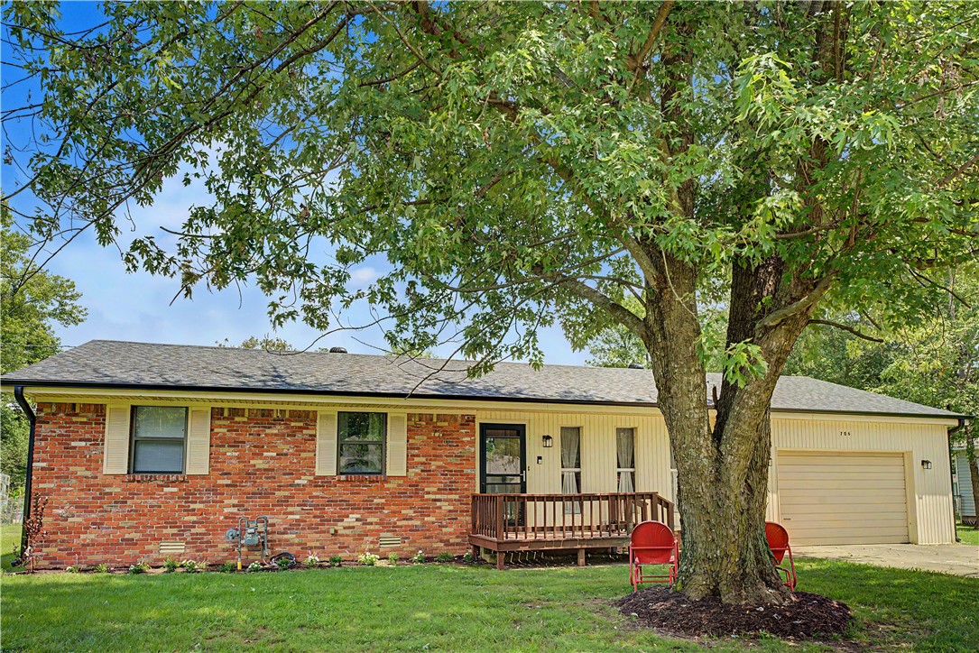 This cute little 3-bedroom, 2-bath home is loaded with charm and upgrades. It boasrts an open concept / great room in a home built before great rooms were cool along with built-ins for your collections, photos, technology, etc. In a quiet subdivision, on a 1/3-acre lot, it's a little bit of "country" without the drive. The large back yard looks out over trees and a open field--not the neighbor's back yard. Many improvements have been made to the home over the past few years including new HVAC system, new flooring throughout, gas range, dishwasher, garbage disposal, new showers in both bathrooms, upgraded plumbing (replacement of old cast iron pipes), new sliding patio doors, and within the last month, new roof and gutters. Within walking distance to Lake Sequoyah and Flying Q Horse Farm. The seller will provide a supreme 2-10 Homebuyers Warranty on the home, and all appliances will convey at the Buyer's request. The icing on the cake is the price: all this for well under $300,000.