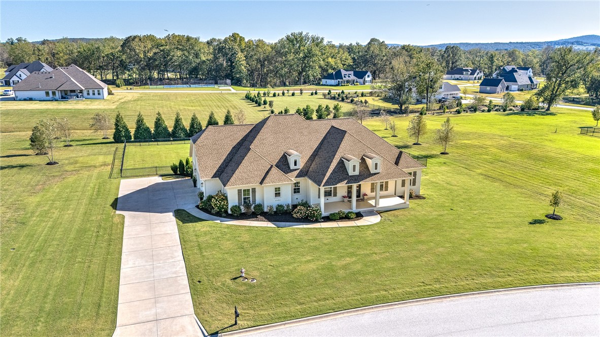 Beautiful 4-Bedroom Home on 2 Acres (With 1/2 Acre Fenced) Pool & 3-Car Garage in Fayetteville!
Discover this stunning 4-bedroom, 3.5-bath home offering 3,380 sq. ft. of thoughtfully designed living space on a peaceful 2-acre lot.This home blends luxury, comfort, and functionality—inside and out.The main level showcases an open-concept floor plan filled with natural light and stylish finishes. The gourmet kitchen features quartz countertops, stainless-steel appliances, and abundant cabinetry, flowing seamlessly into spacious dining and living areas perfect for entertaining. The primary suite on the main floor offers a spa-like bath with double vanities, soaking tub, and walk-in shower. Also on the main level are a second bedroom, full bath, dedicated office, and half bath for guests.Upstairs includes two additional bedrooms and another full bath, providing ideal space for family.Enjoy outdoor living at its finest with a sparkling in-ground pool, expansive patio, and perfect for gatherings or peaceful relaxation.