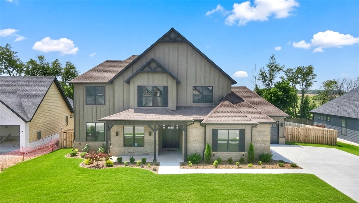 Located in sought-after neighborhood of Big Sky this masterpiece of design & luxury, is a testament to impeccable taste. The heart of this haven is undoubtedly the chef's kitchen, sprawling island, vegetable sink, 5-burner/double oven gas range, quartz counters, walk in pantry, and custom stain. Living room centers around stunning tile gas fireplace, enveloped by oversized windows that bathe the space in natural light. Adjacent, the dedicated dining area with painted accents is positioned for a seamless flow. Retreat to the primary suite, where oversized windows invite in sunlight & spa-inspired bath with a walk-in tile shower featuring double showerheads, soaking tub, double sinks & walk-in closet and direct access to the laundry room. Study with French doors and stunning accent wall and secondary bedrooom on the main level. Upstairs reveals a generous bonus room with a wet bar and two secondary bedrooms. Enjoy the oversized covered patio overlooking the fenced backyard. $3,000 if you use the preferred Lenders