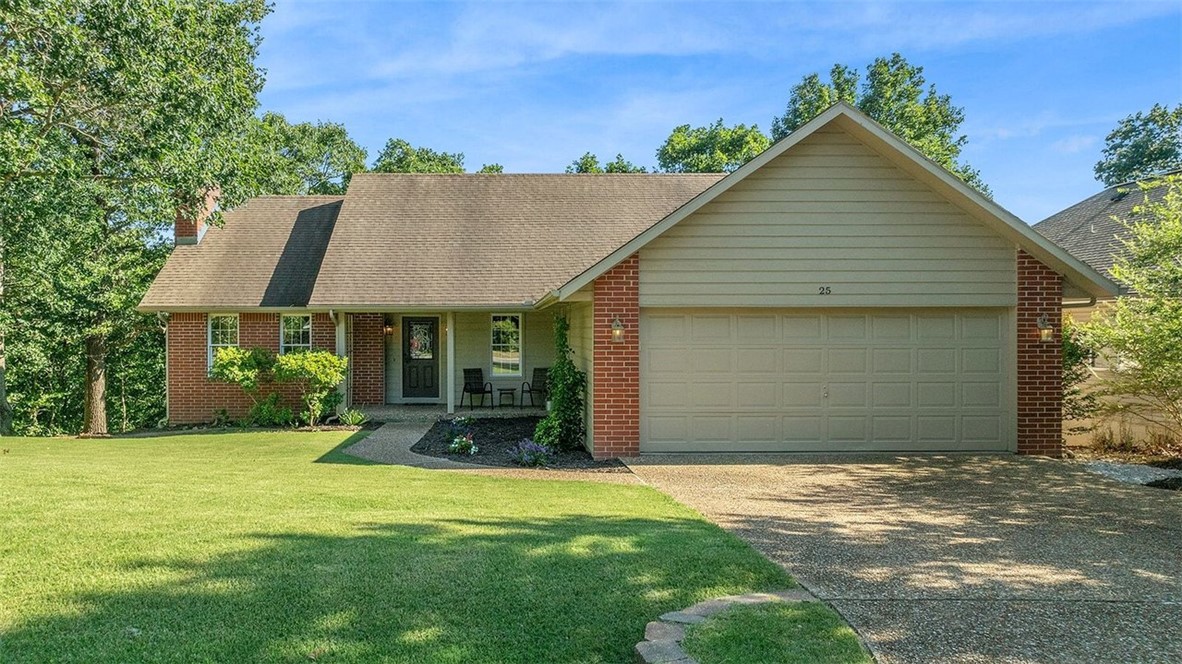Beauty in the Woods! Hardwood floors, large upgraded windows, open and bright!  This gorgeous home has been lovingly maintained.