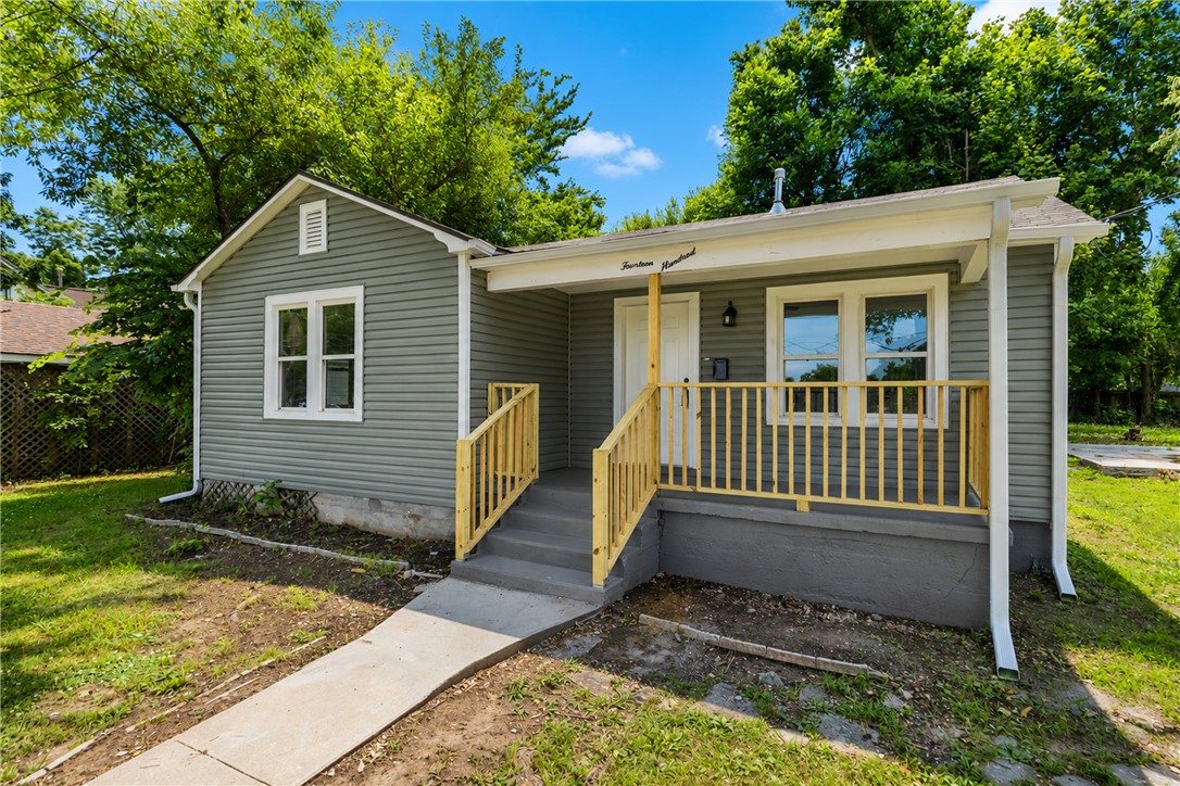 1400 South 4th Street is a charming and affordable home just minutes from downtown Rogers. Thoughtfully updated while preserving its original character, this home features original hardwood floors in the living room and bedrooms, along with classic tile in the kitchen and bathroom.
Recent improvements include updated lighting, a beautifully renovated kitchen and bathroom, and a bright laundry room with excellent natural light and space for plants. For added comfort and peace of mind, a brand-new HVAC system was installed in June 2026.  Outside you will find a huge yard with a concrete pad that you can add your garage, carport, green house, or whatever you like.  Schedule your private showing today!