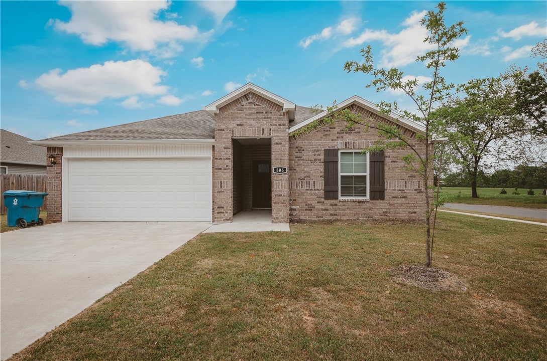 Beautifully crafted and nearly new, this traditional home offers both style and functionality in a desirable corner lot setting. Thoughtfully designed, a split floor plan provides privacy and flexibility, perfect for families or entertaining guests. The heart of the home features a spacious kitchen with elegant granite countertops, Energy Star-rated appliances, and ample cabinetry, seamlessly flowing into the living and dining areas. Natural light fills the space, creating a warm and inviting atmosphere throughout. Outside, the corner lot enhances curb appeal and offers extra space for outdoor enjoyment. With modern finishes, energy efficiency, and quality construction, this home combines comfort and convenience in a timeless design.