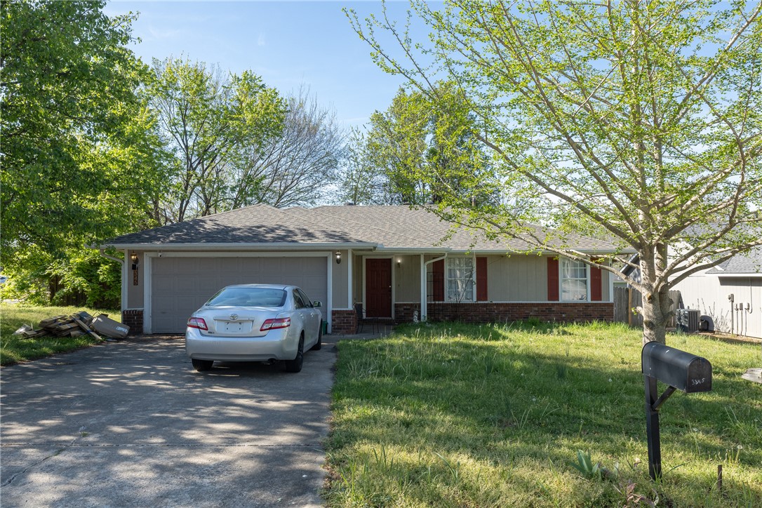 Cute 3 bedroom, 2 bathroom home in popular neighborhood. This home sits on a great corner lot and has great location to I49, UofA and near the Wedington business district. New LVP flooring installed in Living Room, Hallway and Bedrooms. There is a great sunroom off of the backdoor and fully fenced back yard. Wood burning fireplace in vaulted living room. Home needs some cosmetic finishes. Great rental investment, student home or single family home.