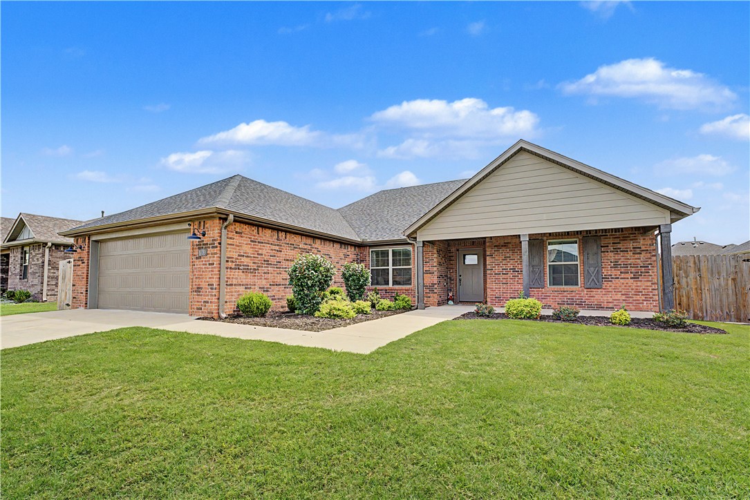 Welcome to this nearly new home in the highly sought-after Hickory Meadows subdivision of Tontitown! This thoughtfully designed 4-bedroom, 2-bathroom single-story residence offers an open-concept layout, and a cozy fireplace in the living room.  Perfect for gathering with family and friends. Covered patio & deck expand the space to watch the game or movie night. Custom built storage building coveys.  

Hickory Meadows boasts resort-style amenities including a community pool and park area with playground — with low HOA fee paid annually.  Zoned for the well-regarded Springdale School District, including Jim D. Rollins Elementary and Har-Ber High School. Conveniently situated in the heart of NWA, you’re just minutes from shopping, dining, and the University of Arkansas. Don’t miss this move-in ready gem!