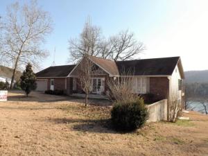 Completely remodeled, 5 bedroom, 4 bath, 3,600 sq ft home on Table Rock Lake.  This home features a full kitchen, granite countertops, tile flooring, living room and dining room on both levels, Jacuzzi tubs, 2-car attached garage, workshop area, a 10 x 88 deck and 10 x 63 concrete patio, landscaped yard, and beautiful lake views.  It is just 1/2 mile from Cricket Creek Rec Area and Marina.