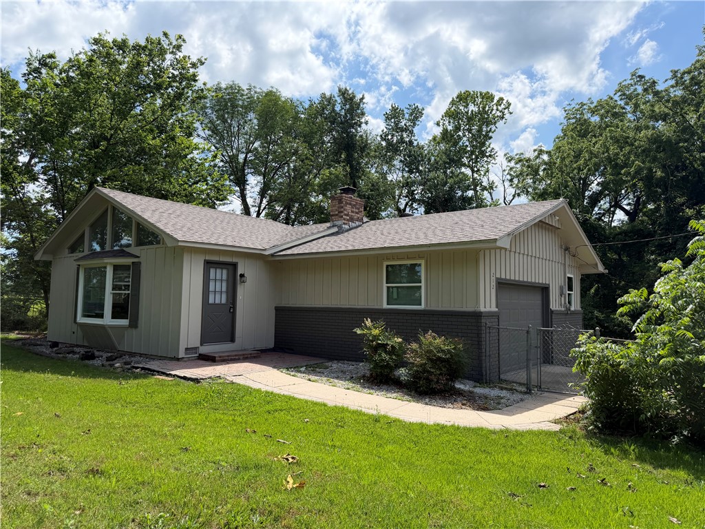 Newly remodeled three bed two bath home sitting on secluded 1.09 acres at end of cul-de-sac. Separate 320 sq ft workshop/garage with covered carport. Spacious kitchen with new countertops and appliances. New windows and new roof in 2025. Wooden deck that overlooks wooded area of property. Agent Owned.