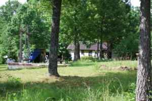 Mobile home/Cabin w/Loft in the woods, with Running creek on part of this  10 Secluded acres, with plenty of hardwoods,this is by Buck Point. hwy 7 North of Dover, turn rt on Pollard Cemetary rd, A Hunters Dream