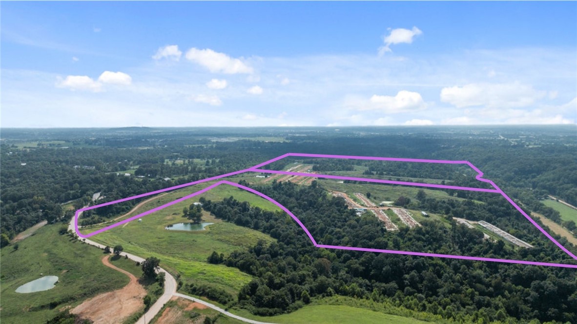 Premier Northwest Arkansas Development Opportunity!
Seize this rare 114-acre blank canvas in NWA, perfectly suited for a high-demand RV resort, luxury glamping destination, or exclusive event venue.
The most significant investment is already made for you: City Water, Natural Gas, and Electric are all on-site, drastically cutting your startup costs and timeline. Two existing wells provide bonus water resources for irrigation and amenities.
The property is being cleared of all former structures, delivering a pristine, shovel-ready site for your vision. The market for unique outdoor experiences is exploding in this region. This is your chance to build a landmark destination with the most critical and costly infrastructure already in place. Don't miss this strategic investment.