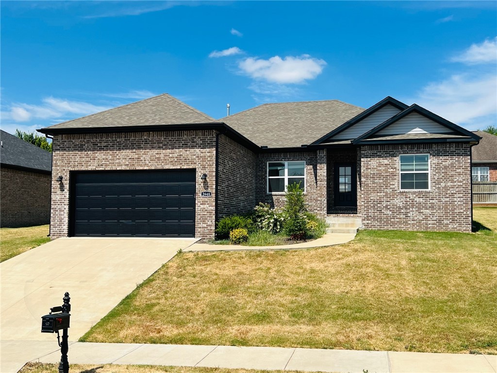 Nice home in Siloam Springs featuring 4 bedrooms 2 bathrooms with wood look ceramic tile in living room and kitchen, carpet in bedrooms, granite countertops, 2" faux wood blinds, nice fixtures, pantry, split floor plan, master suite complete with tub, separate shower, and walk in closet.