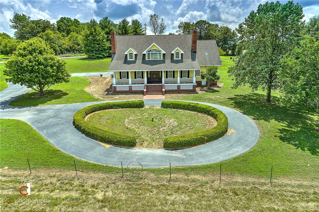 Beautiful Estate home with acreage, overlooking a peaceful valley!  Great place to raise your family and to be close to town, yet in the Country!  Fresh paint & cleaned throughout! Huge game room upstairs, pool table included! Knotty pine office with fireplace.  Huge open kitchen to the living area. 4 fireplaces total & above ground pool.  Some extra inside features: bidet in master bath; fireplace in master bedroom, a "step-up" for child to wash hands in their pvt. bath; cedar closet; attic fan; dumbwaiter for laundry between 1st & 2nd floor; secret gun closet!  Extra features outside: covered front porch 50' x 10'; covered back patio 38' x 7'; a firehose connection that helps lower insurance; 5 dog kennels with storage building.  Reference MLS#1154794 for smaller acreage.