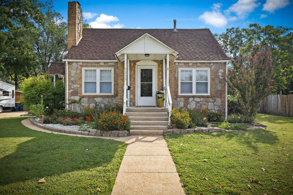 Don't miss out on this exceptionally well-cared-for 3-bedroom, 1-bath home. This home is beautiful and truly one of a kind!. The brick and rock exterior of this home offers a unique style and exceptional charm! The interior is cozy, gorgeous, and in great condition. The home received a new roof in December 2022. Located a short 2.5 blocks down the sidewalk is Harrison Kindergarten. With ample off-street parking on an oversized concrete driveway, you will have ample room for several vehicles or even a boat. You will enjoy the privacy-fenced, landscaped yard full of peonies, ice plants, iris's, day lilies, rose bushes and many other flowering plants and shrubs. The two main bedrooms and full bath are located on the main floor, while the third bedroom is upstairs.