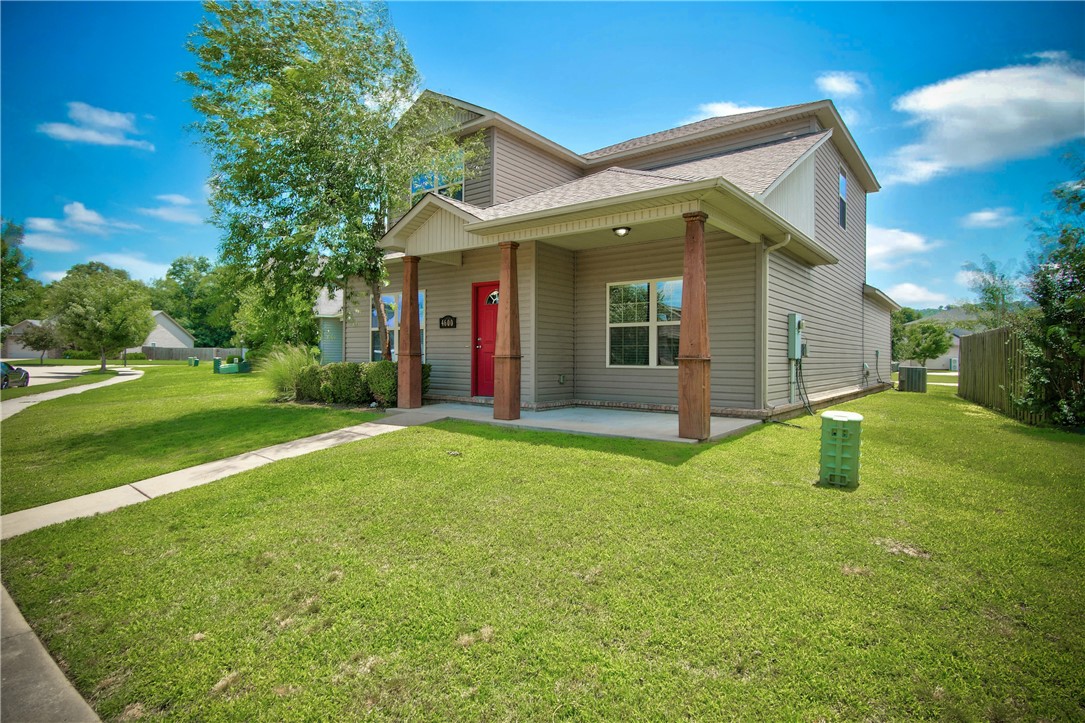 Just 4 miles from the University of Arkansas, this well maintained 4 bedroom, 2 bathroom home is a great option for investors, students, or anyone looking for a low-maintenance property in a convenient location. The primary bedroom is on the main level, and the home features a large laundry room, walk-in closets, 2-car attached garage, and refrigerator that conveys. Sitting on a .11 acre lot, you’ll enjoy minimal yardwork while still having a peaceful, park-like setting behind the home. The alley driveway adds convenience, and the large covered front porch is the perfect spot to relax and enjoy the neighborhood. New roof 2025. Less than 2 miles from shopping and restaurants.