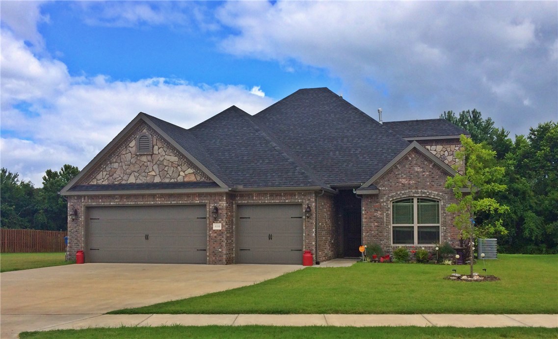 Custom cabinets w/3CM granite, hardwood floors, walk in showers, waterfall shower head in master bath, granite tops in all bathrooms, walk in closets, cent. vac., lots of trim, smart wiring, natural gas hookup for your grill. All brick & rock 100% maintenance free exterior, cellulose insulation. you won't find a home w/ these features at this price. Upstairs has 2 large rooms & 2 baths. This could be a mother in-law suite or awesome for kids space. Green belt on left is included. See attachments for plot map.