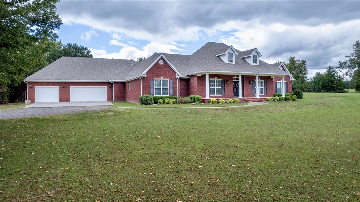Approximately 15 minutes from Chaffee Crossing, Arkansas College of Osteopathic Medicine, and Arkansas Colleges of Health Education—and just 20 minutes to Fort Smith—this Justin Green-built home offers space, comfort, and privacy on ~14 acres in Lavaca. Featuring 6 bedrooms, 5 bathrooms, and over 4,200 sq ft, the split floor plan provides both functionality and separation. Interior highlights include solid wood cabinetry, custom built-ins, Corian countertops, Energy Star appliances, pantry, and breakfast nook. A dedicated office offers flexibility and can serve as a formal dining space. Additional attic space allows for storage or future expansion. Outdoors, enjoy a saltwater in-ground diving pool, two ponds (one stocked), and open acreage suitable for multiple uses. The oversized 3–4 car garage includes a third bay with dual doors and a large storage room. Ideal for multi-generational living, remote work, or entertaining, this property combines a peaceful setting with convenient access to nearby amenities.