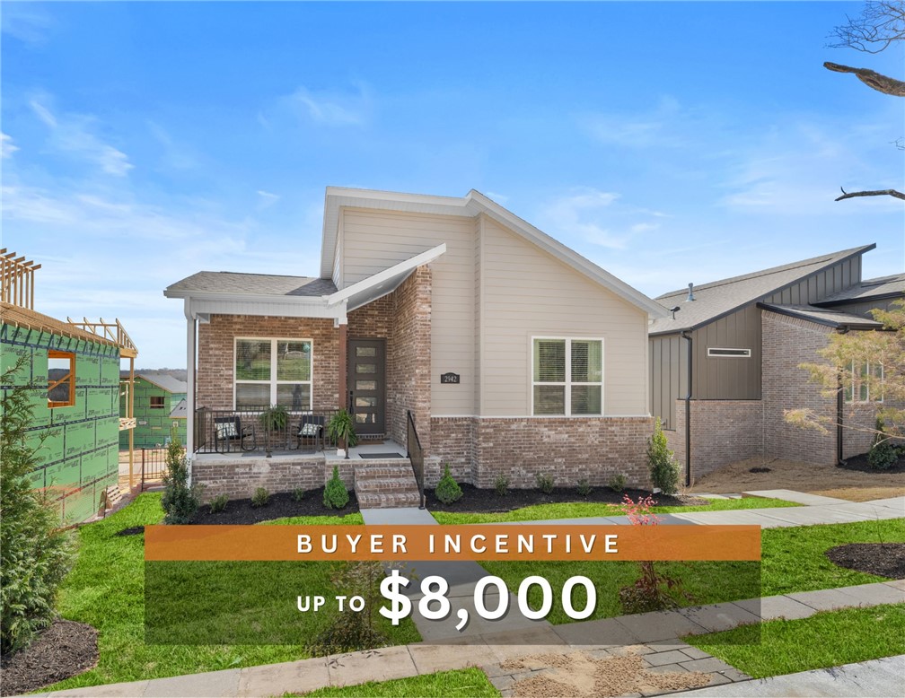 Discover this stunning modern home in the perfect East Fayetteville location—just a short walk to beloved Gulley Park! Kyrie floorplan featuring designer finishes throughout. Enjoy a spacious open floorplan with a large living room, electric fireplace, and beautiful wood flooring. The chef’s kitchen boasts 3cm quartz countertops, stainless steel frigidaire professional-grade appliances, custom cabinets to the ceiling with soft close door hinges, vented hood, and a walk-in pantry. The luxurious primary suite includes hardwood floors, custom beams, and a spa-like bathroom with walk in tile shower, double sinks and walk in closet. With a formal eat in area, cubbies to keep you organized, large covered balcony, and included blinds and gutters, this home blends comfort, style, and convenience in one unbeatable package. POA maintained lawncare and access to Niokaska Creek Trail from the neighborhood!