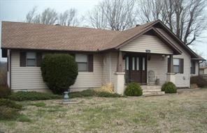 3 bedroom and 2 bathroom farmhouse in Cave Springs. Private lot right on Hwy 112. Bentonville schools.